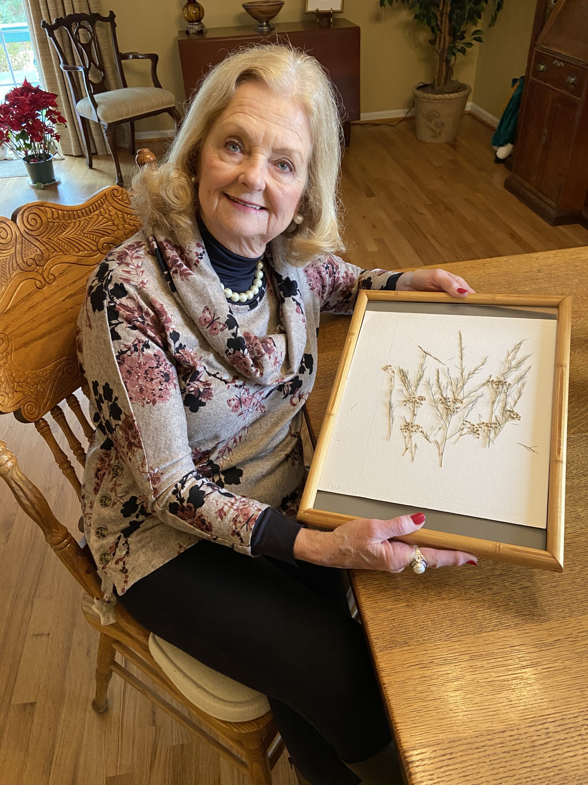 Nancy Heilman with Pressed Flower Artwork